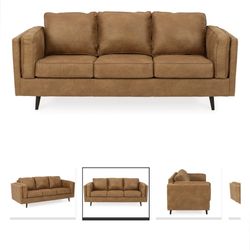 Brown three-seater armchair.. Very good condition.