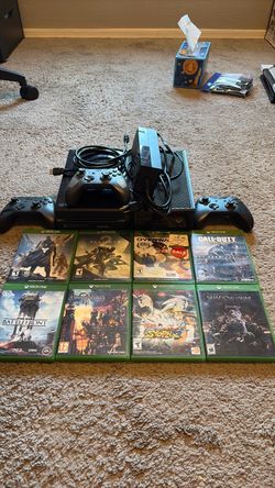 Xbox One with 8 games and 3 controllers