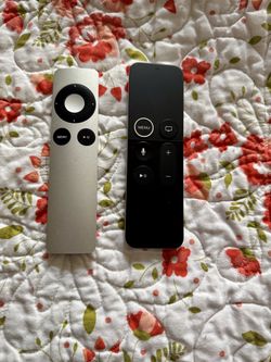 Two Apple TV Remotes.