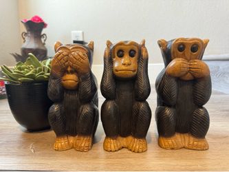very cute wooden monkey figurines