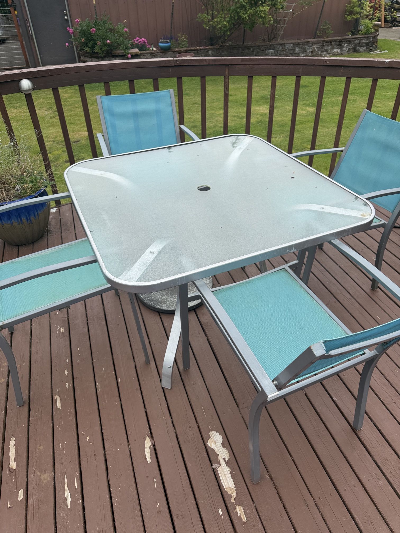 Glass Table And Four Chairs