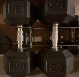 Pair of 65 lb fixed hex urethane dumbbells