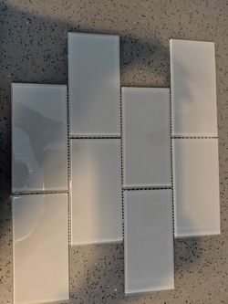 Grey glass back splash. Price is for one sheet