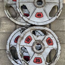 Pairs Of 35 And 45 Pound Olympic Weights