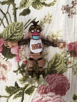 It’s Brown And Dark Brown. You Can Take It Apart Put It Back Apart The Collection I Guess And Scary.