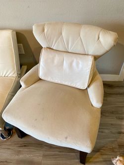 2 chairs and a futon