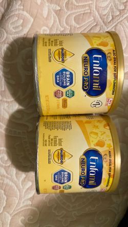 Two 7 ounce Enfamil  baby formula cans