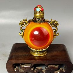 Vintage Tibetan-Style Snuff Bottle – Dragon Handles & Amber Swirl Glass (Decorative Collectible