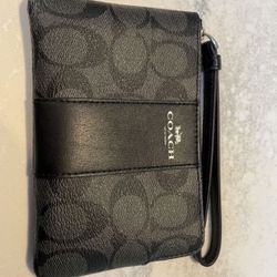 Black leather Coach Wristlet