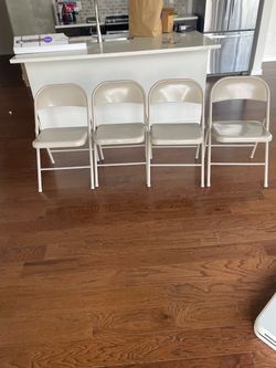Four folding chairs