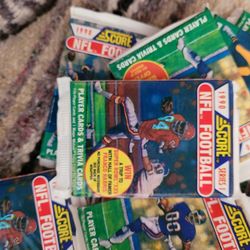 Unopened, packs of NFL cards.