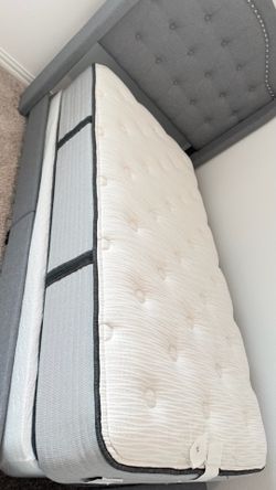 Twin bed frame , box , mattress hardly used