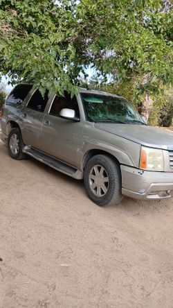 2004 Cadillac Escalade 18 inch stock rims