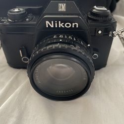 Nikon EM Film Camera With Lens And Filter