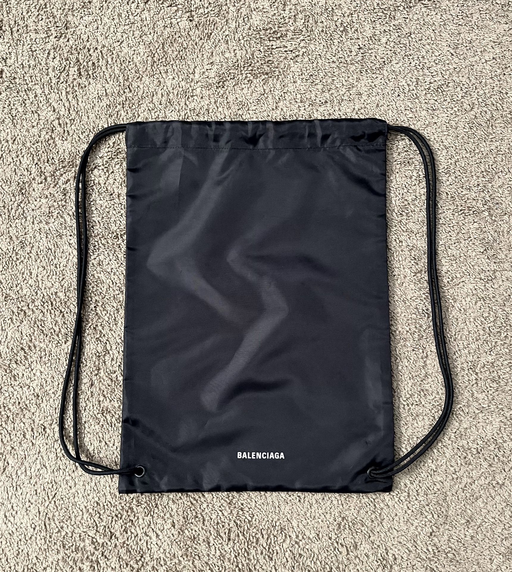 Balenciaga drawstring backpack and or dust bag. Brand new never used. Lightweight and simple it s an easy way to store and carry the gear you need to Jewelry Accessories