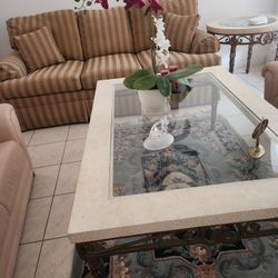 Glass top coffee tables with quarz countertops.