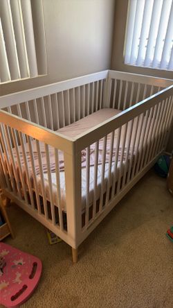 Standard crib with crib mattress