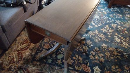 Fold out table with drawer