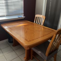Large heavy duty table with 6 chairs and leaf