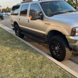 2002 Ford Excursion, 7.3 Diesel what 186,000 miles selling for $13,000