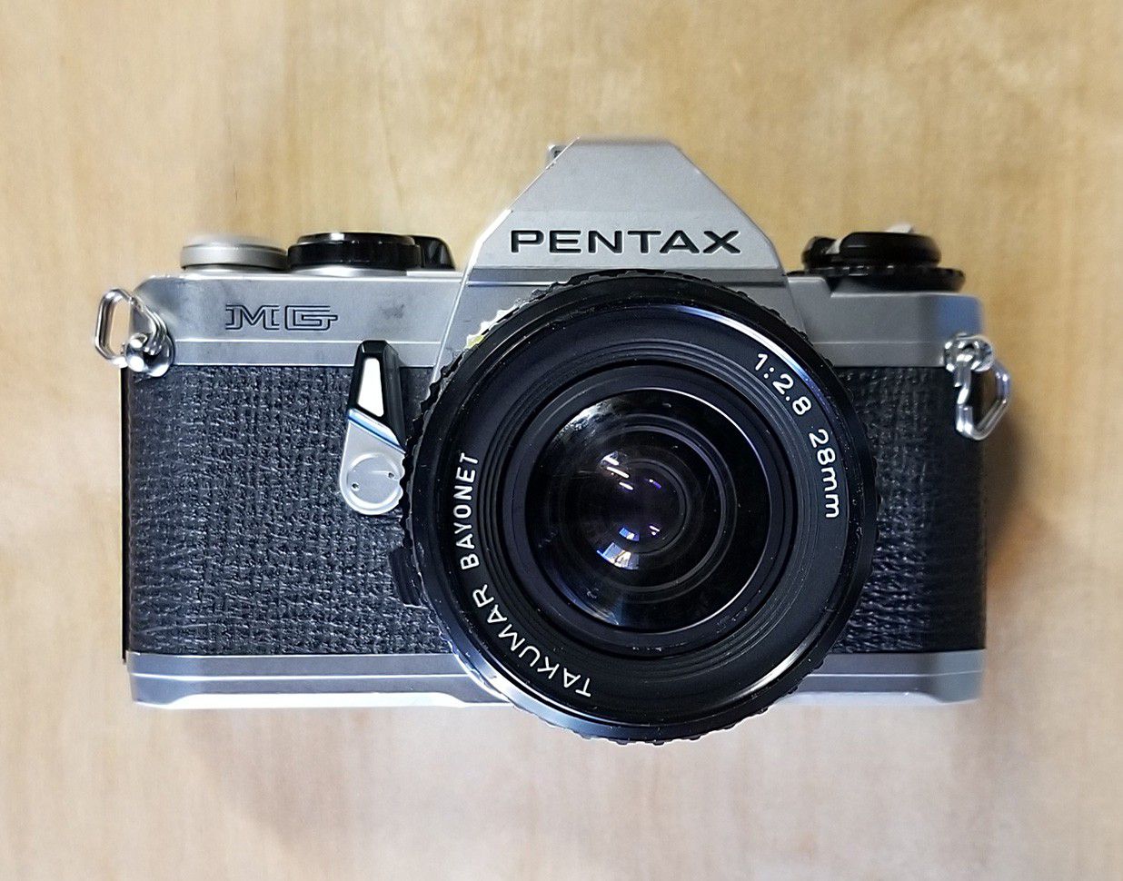 Pentax MG 35mm SLR Film Camera comes with 28mm 1:2.8mm Takumar lens and Zoom 200mm 1:4.5 Lens