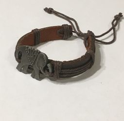Dark brown leather bracelet with silver elephant charm