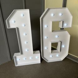 Large light-up marquee numbers “16”