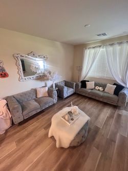 GREY TUFFED SOFAS