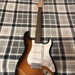Electric guitar Squier by Fender Stratocater