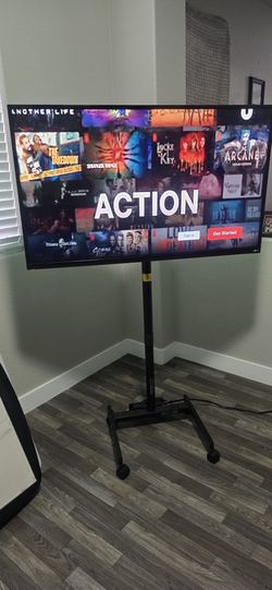 Vizio 48" Smart tv with rolling stand and back Led lights
