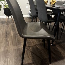 4 Brand New Gray Faux Leather Chairs