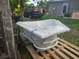 WHITE CORNER JACUZZI TUB- BRAND NEW