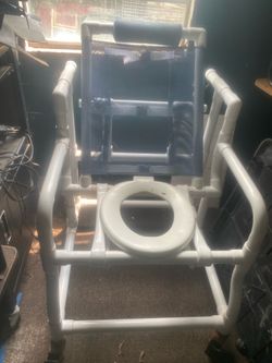 Mobile shower commode chair