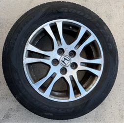 This is a 2011–2013 Honda Odyssey EX/EX-L 17-inch OEM Factory Alloy Wheel.