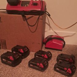 Various Milwaukee M18 Batteries And Chargers