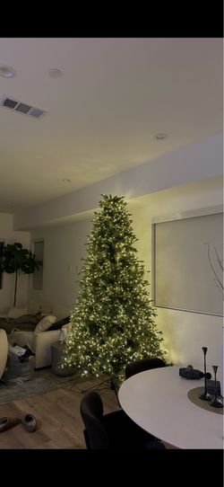 9ft Christmas tree!! Has 4 different light settings.