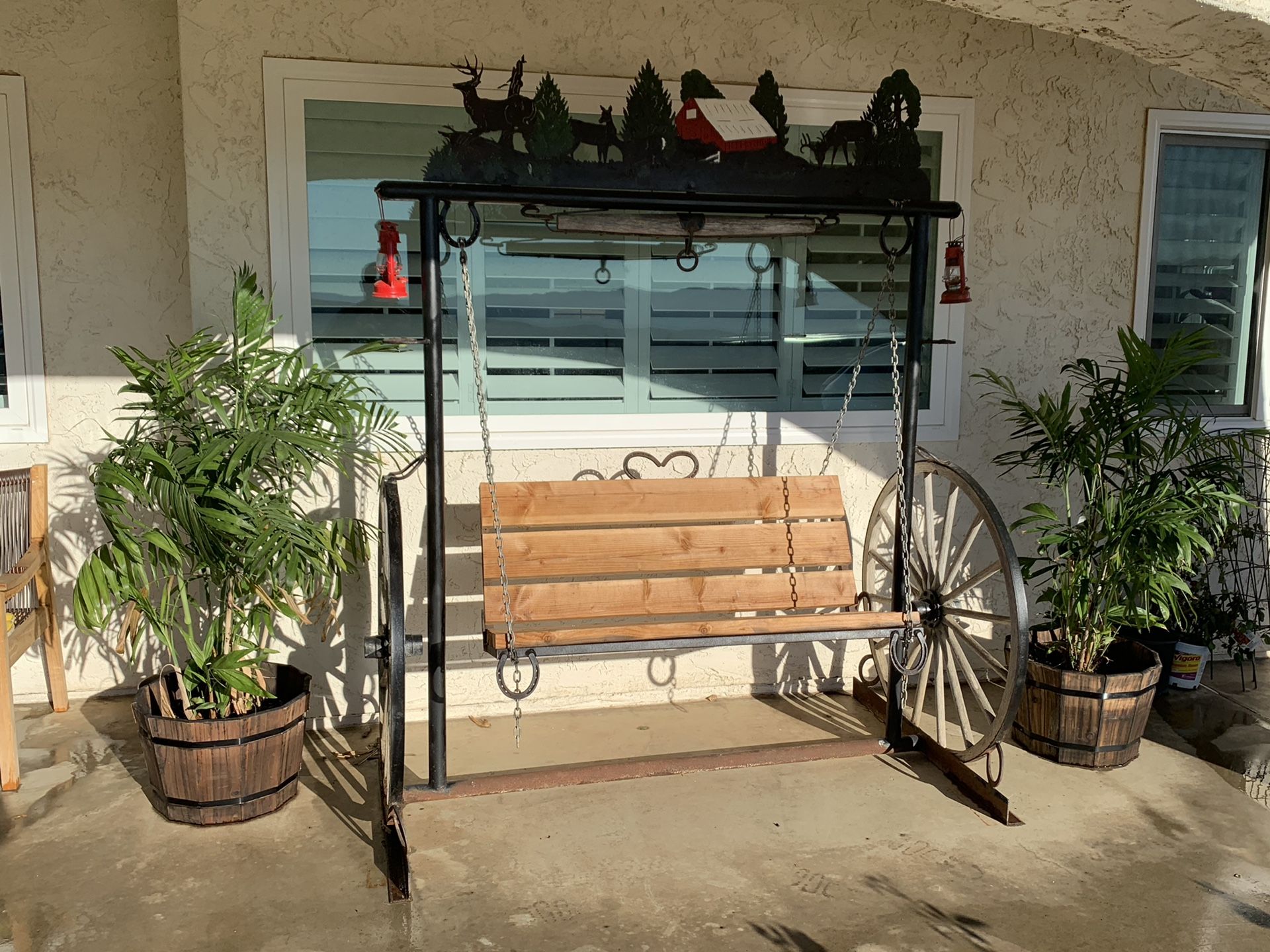 Wagon wheel porch swing