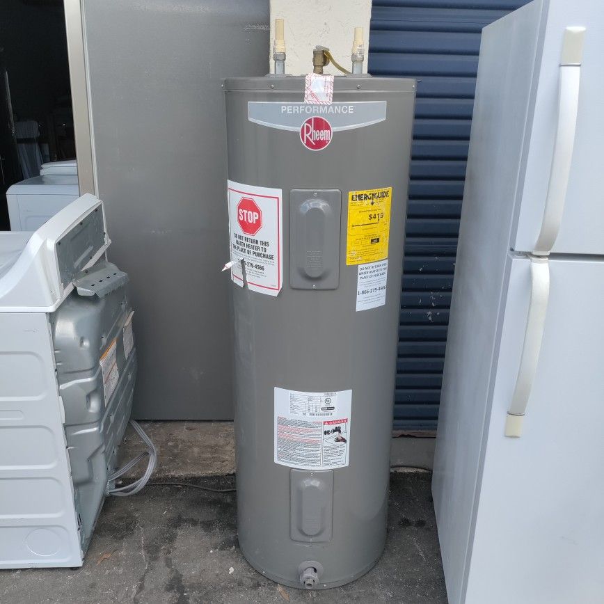 like new Rheem 50 gallon hot water heater with warranty and can install