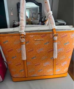 Authentic X-Large tote purse new with tags