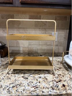 Gold stand $15