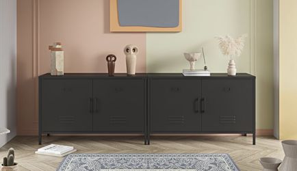 Two black metal storage cabinets / sideboards with a shelf