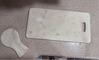 Marble cutting board and spatula rest