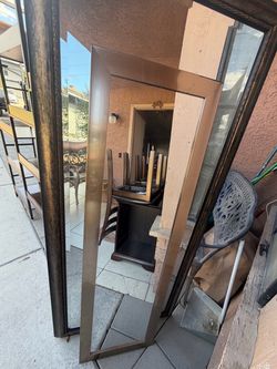 Narrow silver/brown framed floor mirror
