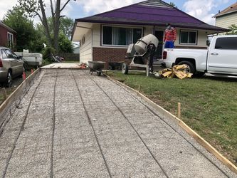 concrete driveway reinforced with steel rods and mesh