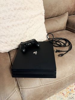 Playstation 4 Pro with controller