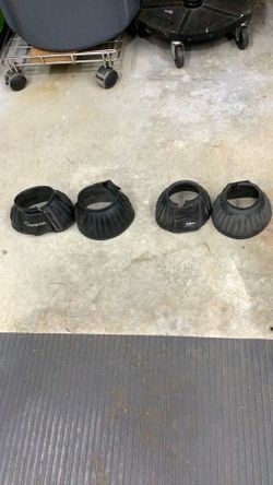 Two sets of Bell boots for horse protection.   One is by Karma the other by Cashel