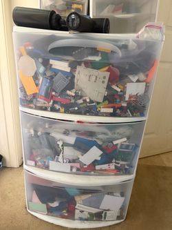 Box full of Lego pieces