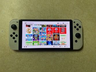 Nintendo Switch OLED with 512GB SD Loaded with 7500 Games
