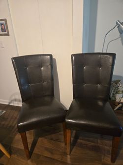 2 Faux leather chairs