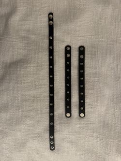 Spike-Studded Black Leather Bracelets and Choker